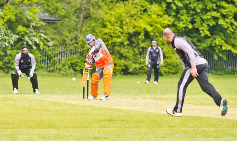 Game of cricket at Peter May Sports Ground