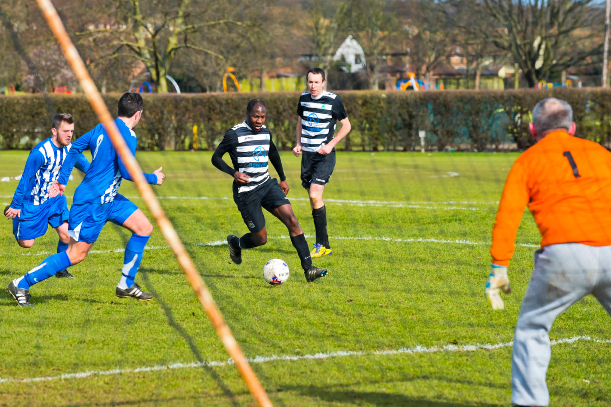 Football game Fairlop Oak Playing Field orange goalkeeper