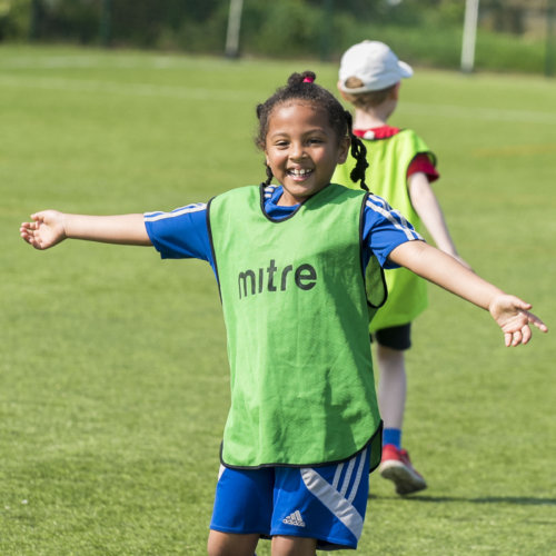 Smiling girl playing sport