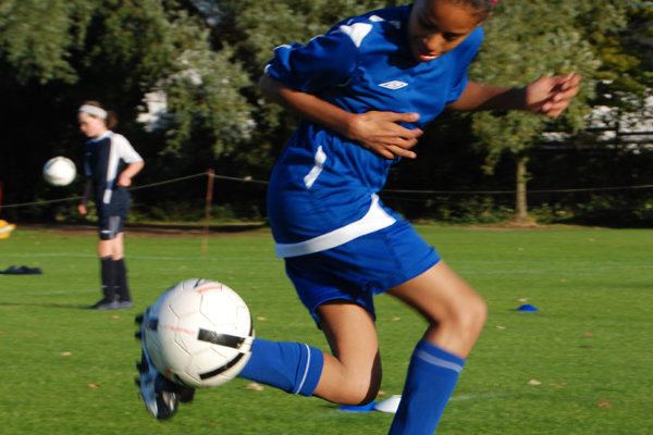 Girl showing football skills